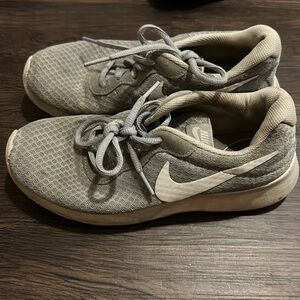 Grey Nike tennis shoes